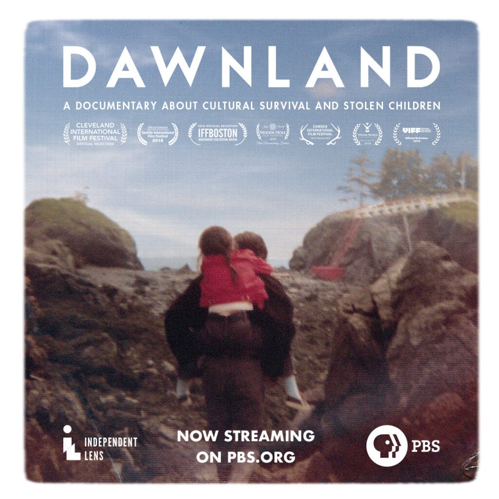 Dawnland Film showing two individuals sitting on a rock]